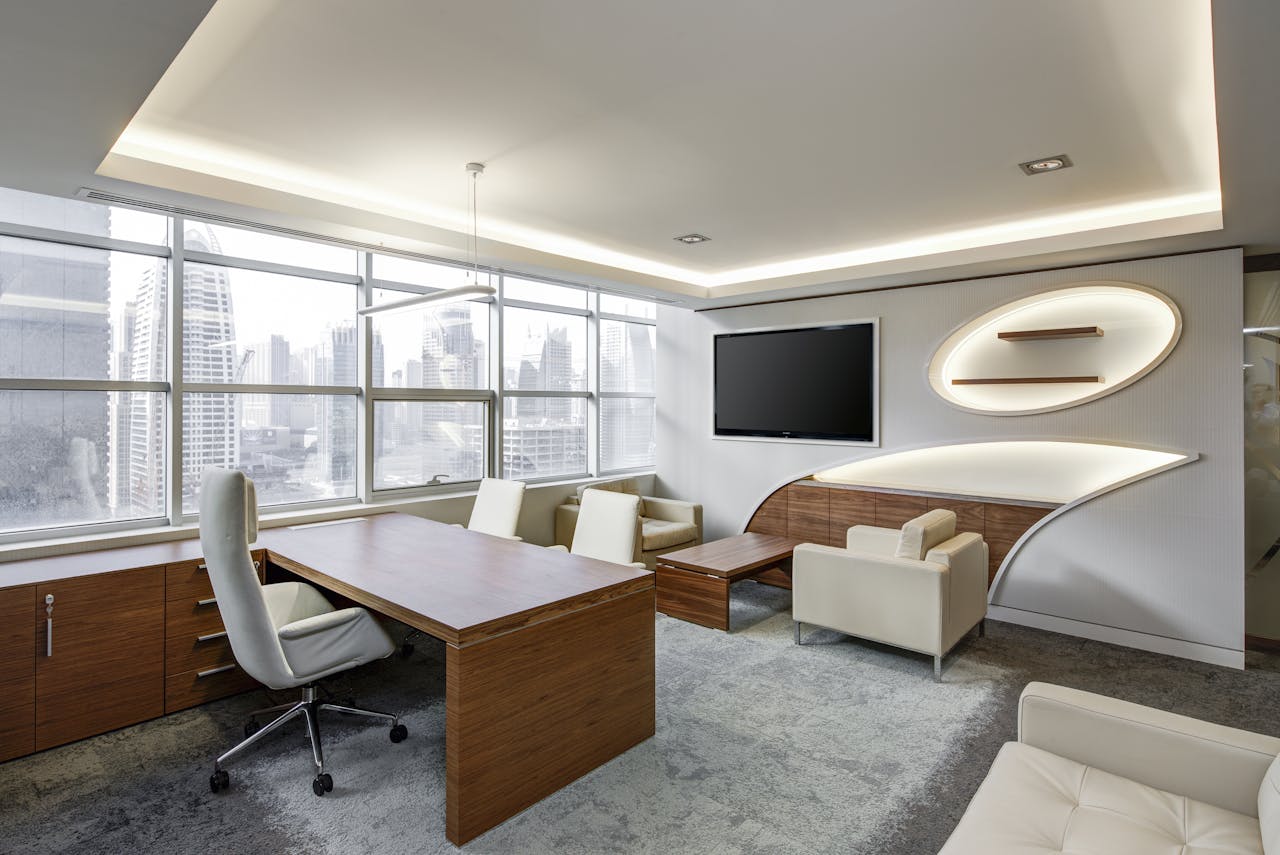 services-03 Sleek office space featuring contemporary furniture and city skyline views, ideal for professionals.