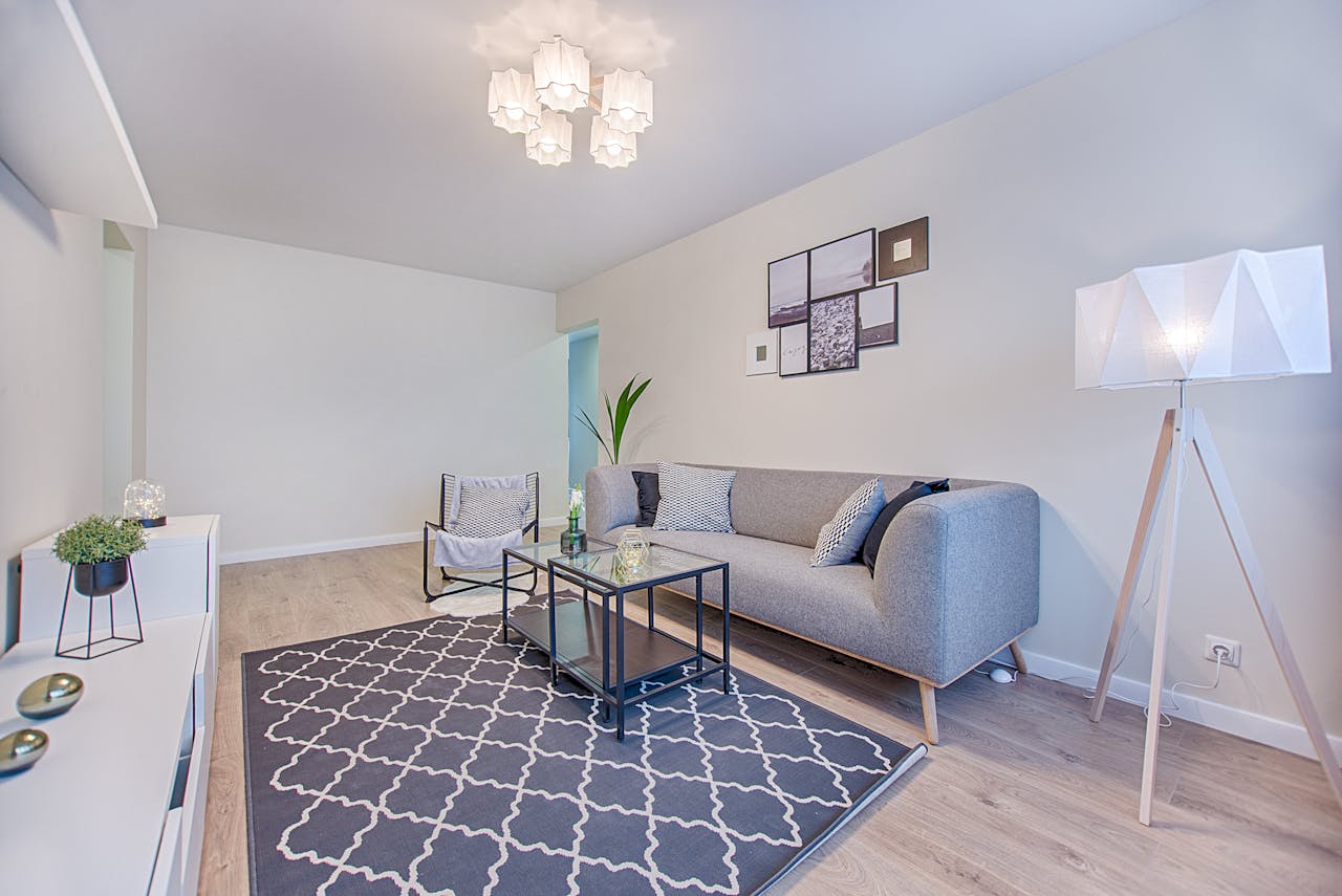 services-04 Sleek and stylish living room with modern furniture and minimalist decor in a contemporary apartment.